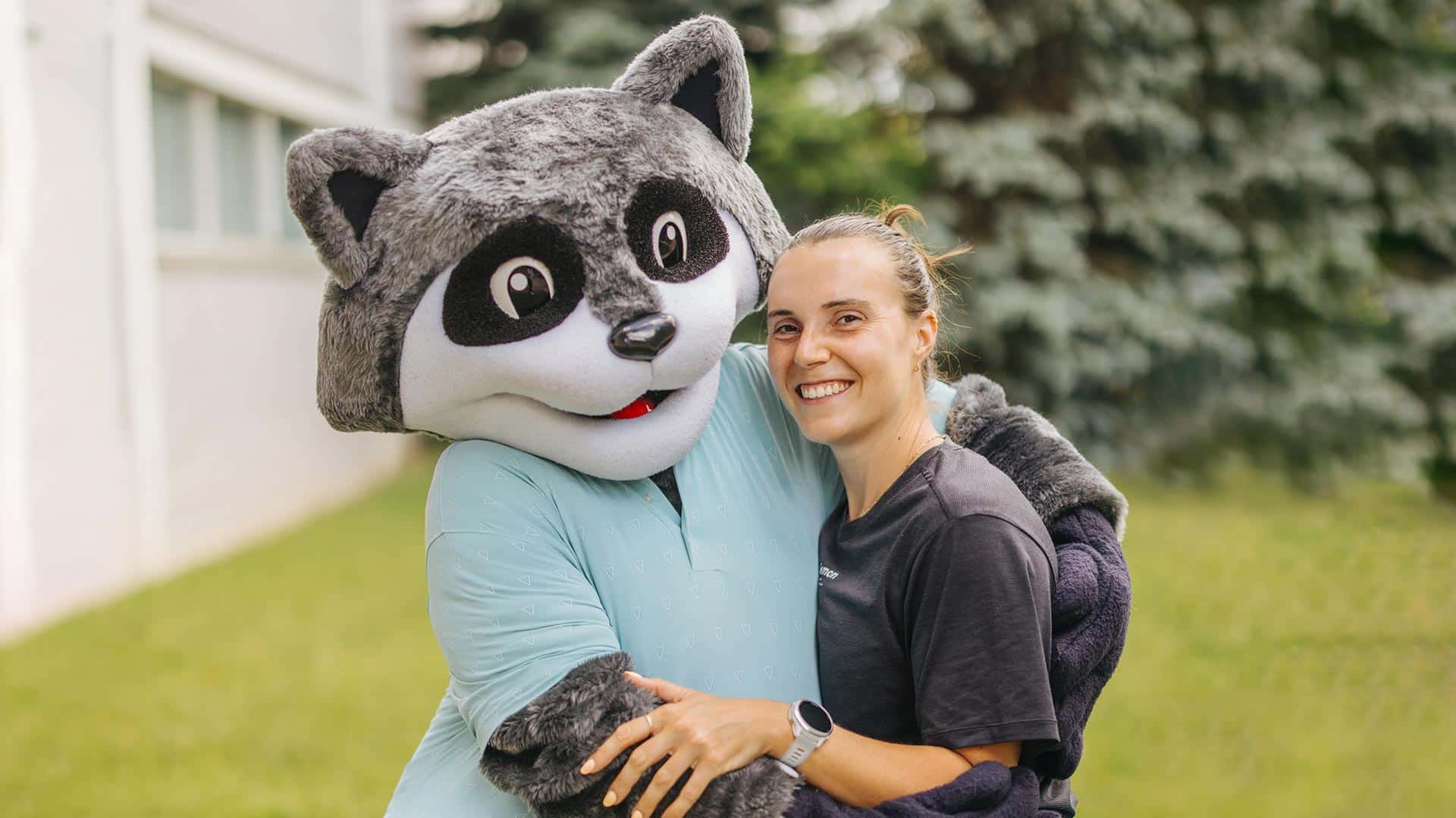 Lisa Marino with Rocky the Raccoon